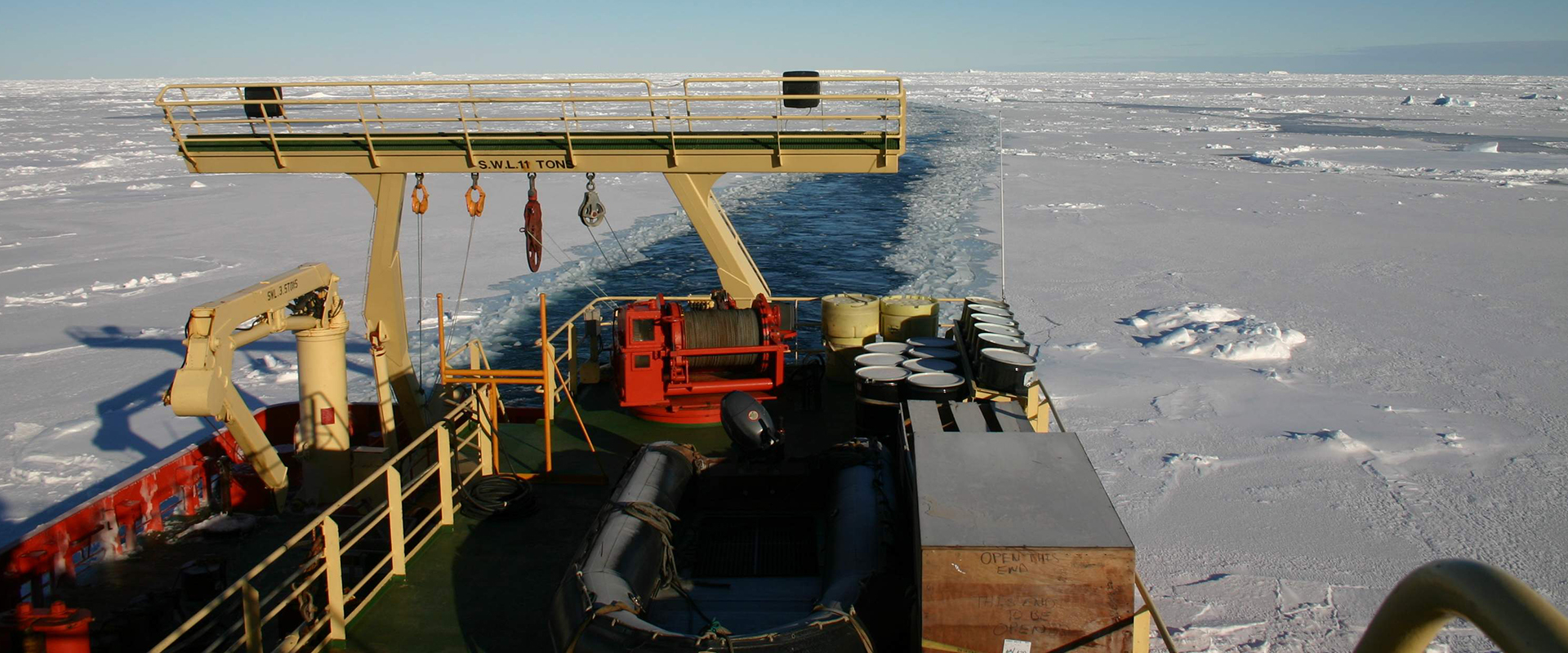 Ship breaking through ice